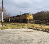 A train thunders along the track